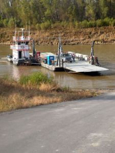 We'd park our station wagon on the barge and all get out of the car and watch the Mighty Mississippi move us toward  the other side.  It smelled earthy and dank and felt like home.