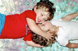 My children as babies, innocent and playful and loving each other.